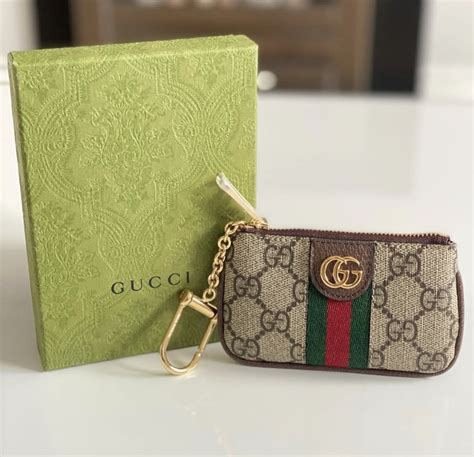 gucci coin pouch fake|replica Gucci.